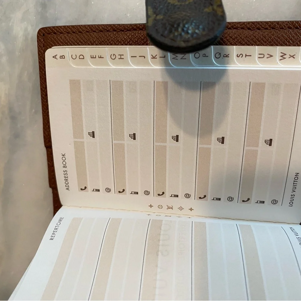 AUTHENTIC Louis Vuitton Monogram mini address book, 2003 United Cancer Gala